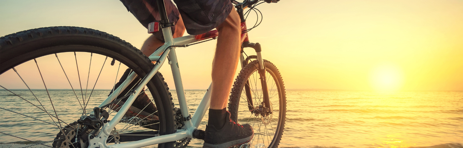 2 of 3, Biking on the beach.